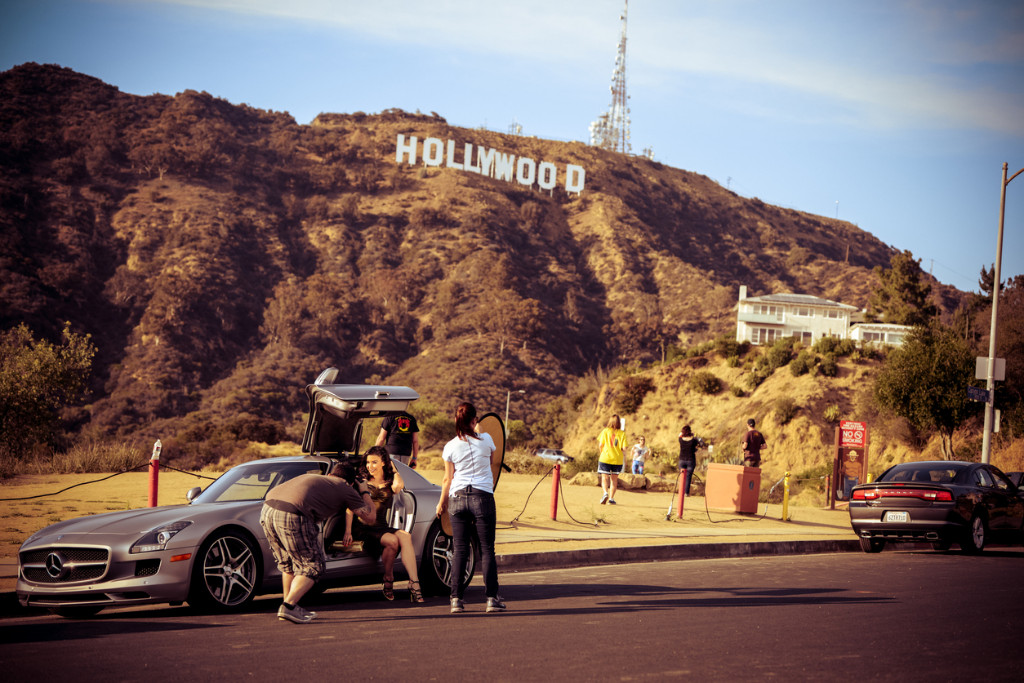 A photoshoot with the Hollywood sign at the background